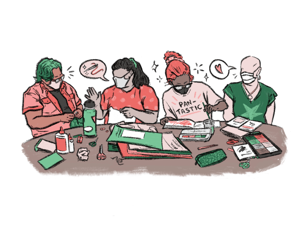 A group of young people doing crafts together.